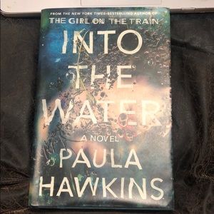 Into the Water by Paula Hawkins.